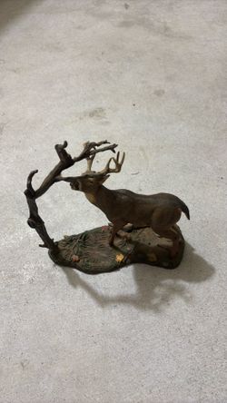 This deer sculpture is titled "Leaving His Mark"