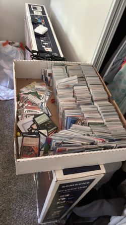 Lots of old baseball,football,and basketball cards