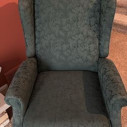 Vintage recliner wing back chair.