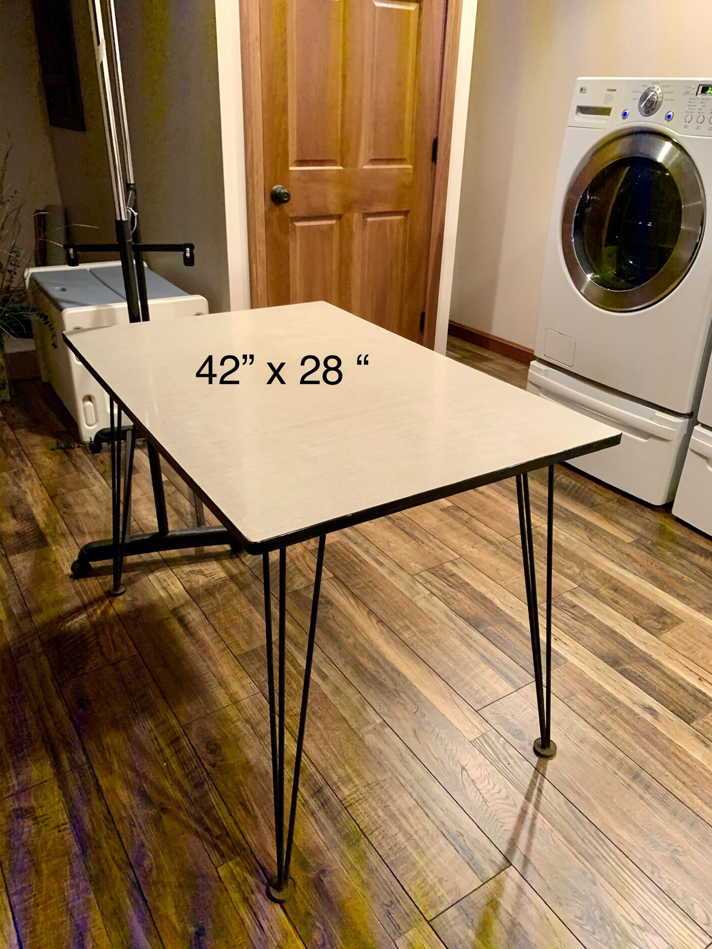 Mid century kitchen table . Size 28” x42” 30” high can also be used as a kitchen island ! Hairpin metal legs