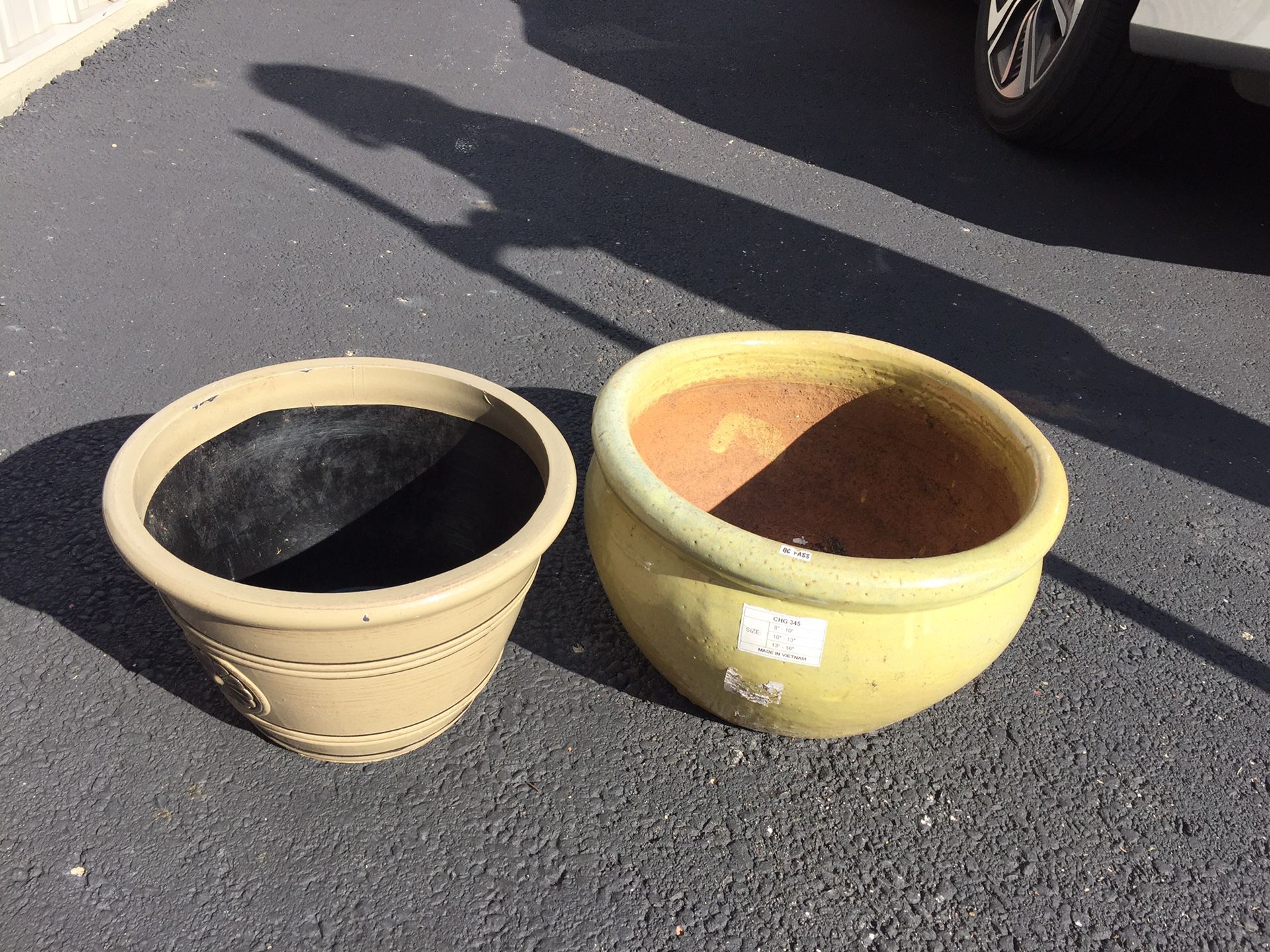 Ceramic flower pots used in good condition. Asking $20 each and negotiable