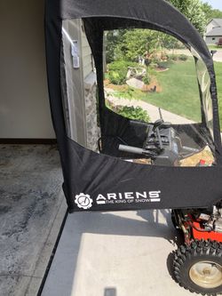 Storms 30” width 21” height,all steel construction,dual belt,auto power steering,heated hand grips,with weather enclosure. Used once snowstorm Evelyn