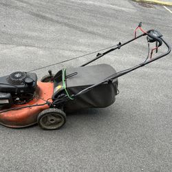Husqvarna self propelled mower with honda engine. Runs Great, Only Problem is That it Needs a Bungee Cord to Hold on Bag , See Pictures 