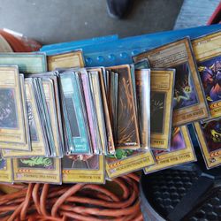 65 Yu-Gi-Oh Cards