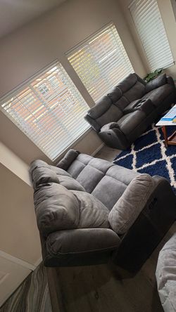 Gray couch sectional are for sale