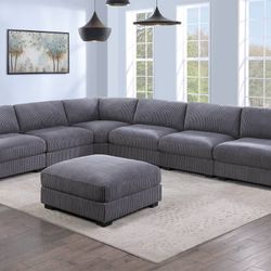 127x164 Brand New Dark Gray Sectional With Ottoman