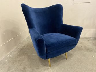 ANTHROPOLOGIE Blue Velvet Wingback Chair with Slender Brass Legs