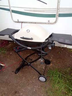 Weber Gas Grill and portable stand
