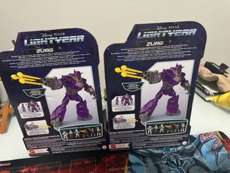 Mattel Disney and Pixar Lightyear 12-in Scale Action Figure, Zurg with Lights, Sounds, Blaster & Projectiles