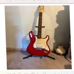 Electric Guitar Rock Hard with Superior Sound Technology hold letter