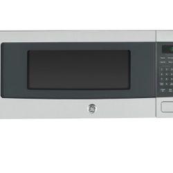 GE microwave oven 12-1/8"H x 24"W x 12-7/8D