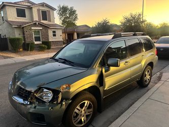 But for sale is a 2005 Mitsubishi endeavor four-door automatic fluid loaded all power all leather interior runs and drives. Good does have some body d