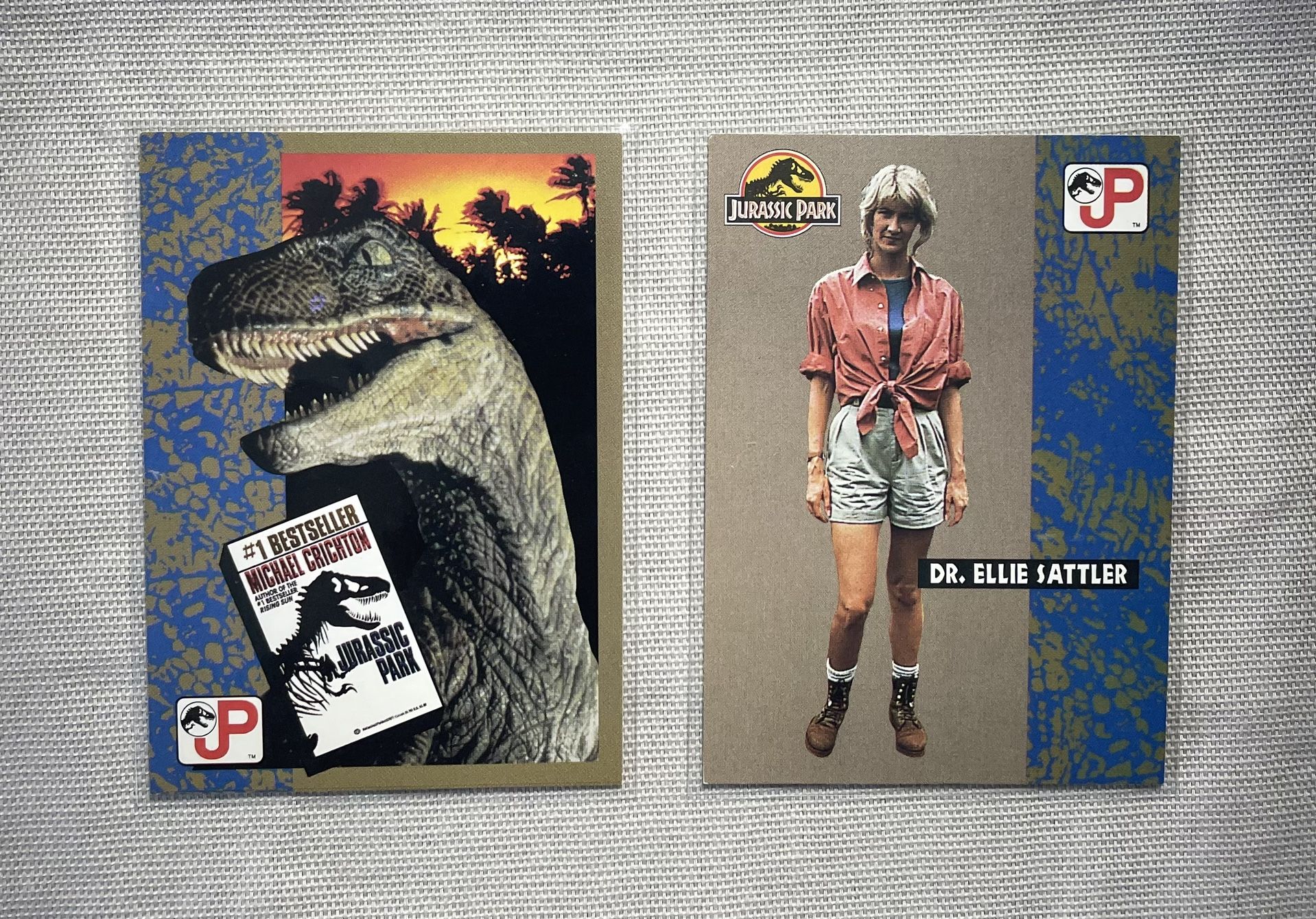 π₯β€οΈπ¦ 1993 Jurassic Park (2) Card Lot - Topps Trading Cards - The Novel by Michael Crichton and Sattler π¦β€οΈ