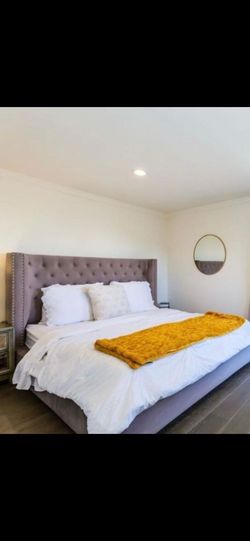Tufted Upholstered Bed Frame with Wingback Headboard