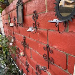 Metal wall candle holders
