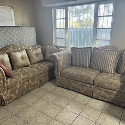 2 beige/golden couches