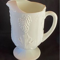 Vintage 10 Inch Footed Milk Glass Water Pitcher in the Grape and Leaf Pattern