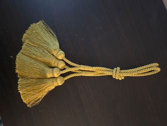 Two Gold drapery/curtain tie backs with tassels