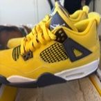 Jordan's 4 Lighting Yellow Size 4.5 Kids