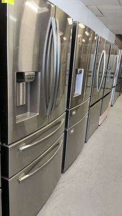 HUGE SAVINGS   Four-door refrigerator