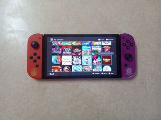 POKEMON EDITION NINTENDO SWITCH OLED with 120 SWITCH GAMES INSTALLED