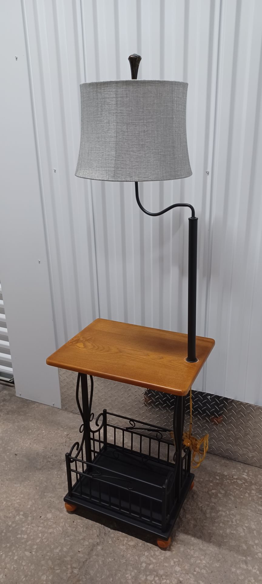 FLOOR LAMP/ TABLE with magazine rack good condition