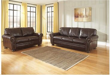 Banner (leather)sofa & loveseat by Ashley