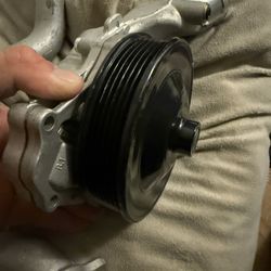 Water Pump For A Land Rover 