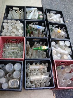 Old soda and milk bottles all kind of brands of soda 321 in all