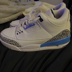 Blue and white Jordan’s size 8.5