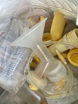 Medela  breast nursing baby bottles and pump lots lots