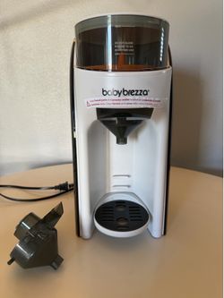 Baby Brezza formula maker with extra funnel
