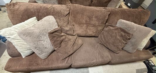 Two Brown IKIA corduroy sofas