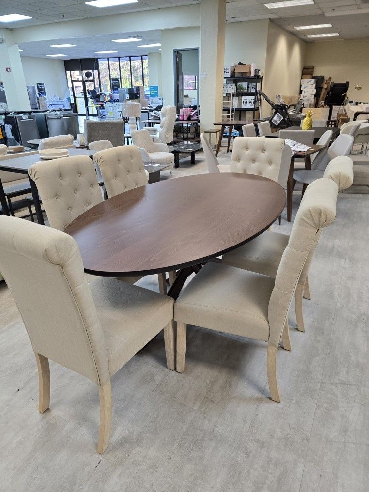BRAND NEW 
Crossroads 69" Oval Wood Dining Table With 6 Solid Wood Upholstered Dining Chairs Set