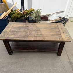 Used rustic real wood coffee table (slightly weathered)