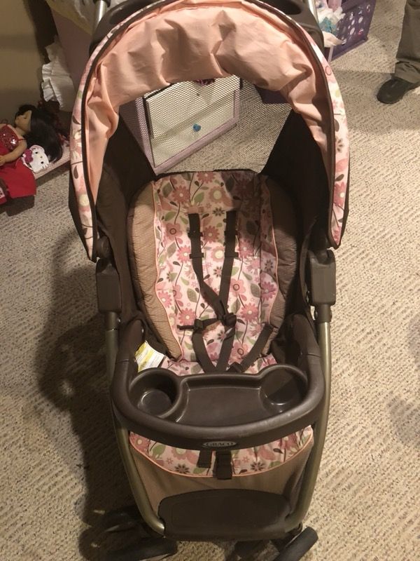 Graco stroller with carrier and car seat base for Sale in