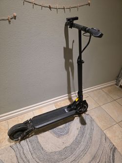 Fluidfreeride Horizon Long Range Electric Scooter + Charger & Spare Tire – 399 Miles