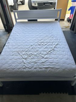 Queen bed mattress and bed