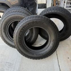Four used tires in like-new condition