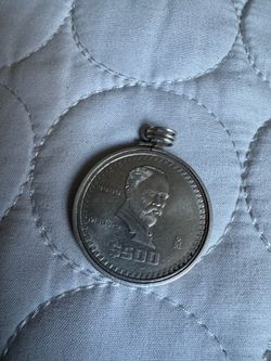 Moneda y bizel