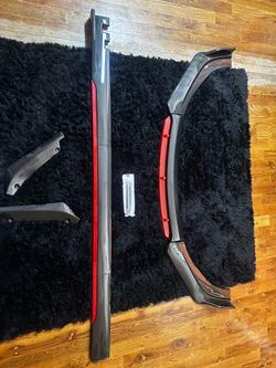 Lip and side skirts