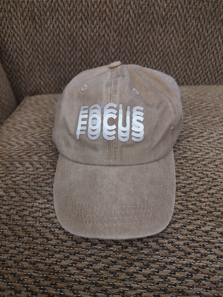 FOCUS BASEBALL CAP. ADJUSTABLE CAP. NEW. PICKUP ONLY.
