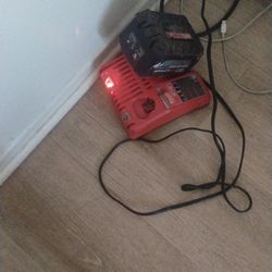 Milwaukee  battery charger and battery