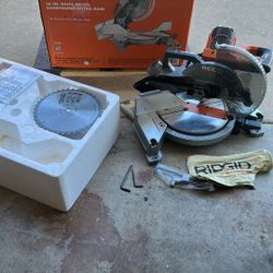 RIDGID 15 Amp 10 in. Corded Dual Bevel Miter Saw with LED Cut Line Indicator.