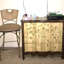 Brown Floral Dresser And Two Tall Wicker Chairs