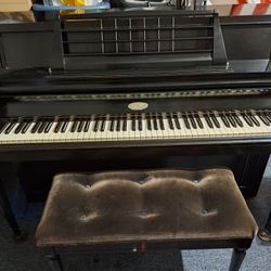 Black Upright Wurlitzer Piano
