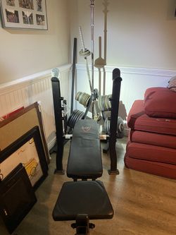 Bench And Bar With 330 Pounds Of Weights 