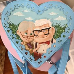 Lounge Fly Heart Shaped Purse/Backpack “UP”