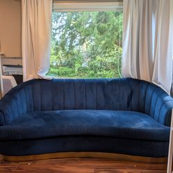 Dark blue with gold trim couch