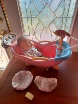 Baby Doll with Toy Bathtub Play music a d pumps real water